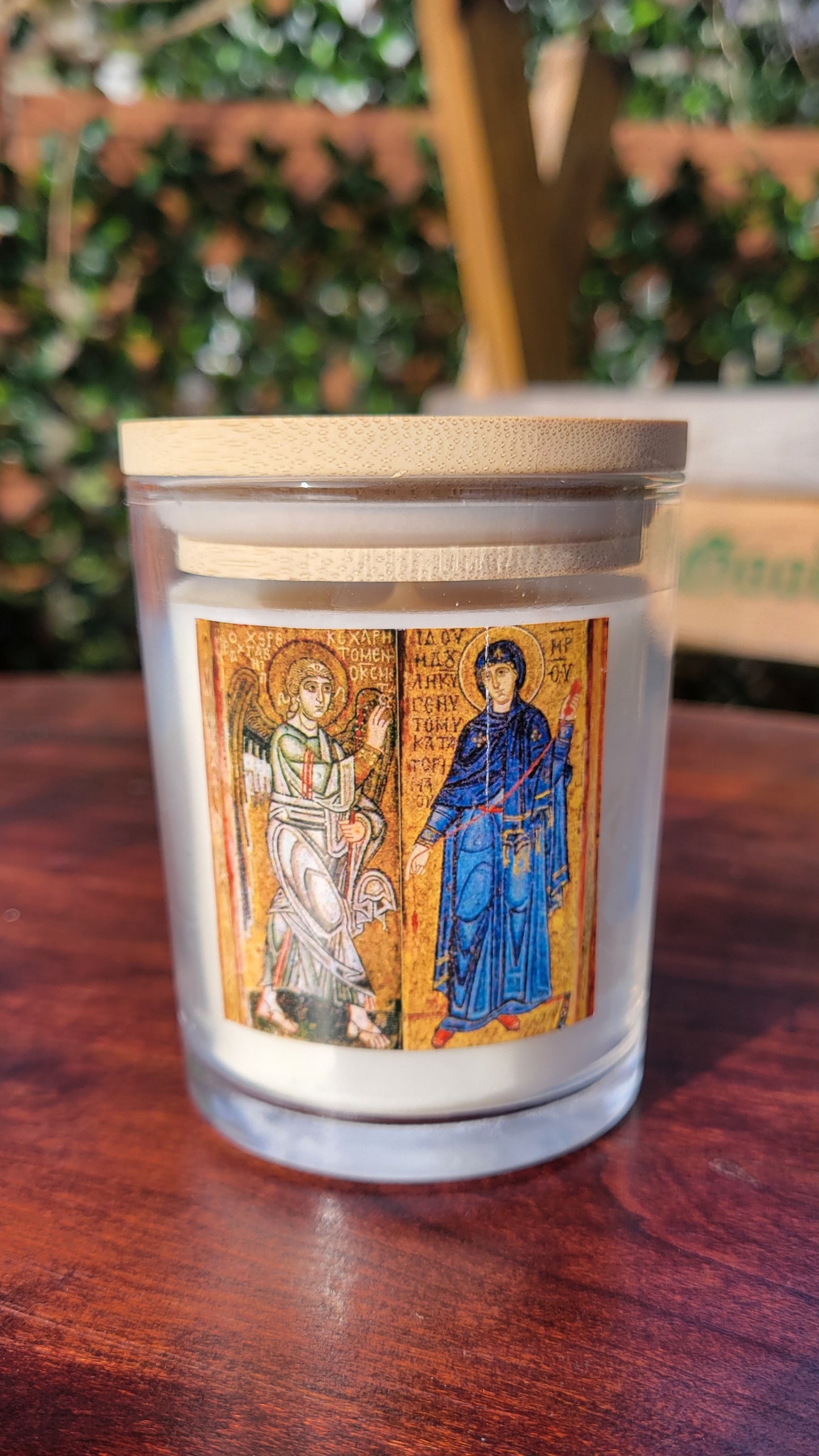 A picture of a candle at the GLH workshop featuring a picture of the mosaic in Kyiv's Saint Sophia Cathedral depicting the Annunciation by the Angel Gabriel to the Virgin Mary